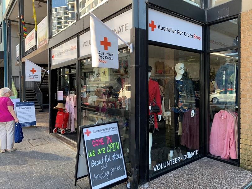 a store front with signs