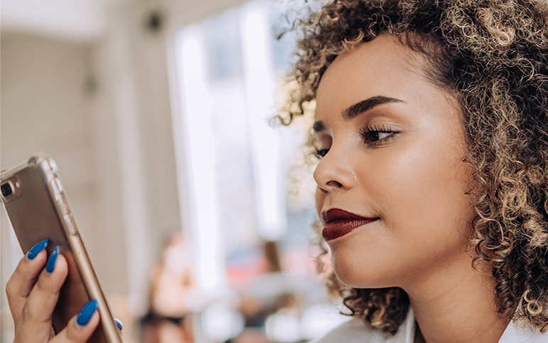 a woman looking at her phone